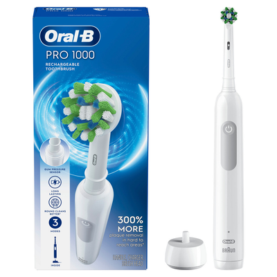 White rechargeable electric toothbrush with round brush head, charging base, and retail box