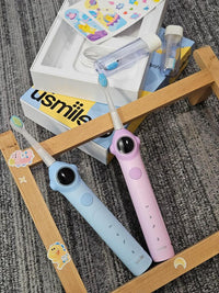 The "Talking Coach" actually teaches them how to brush.